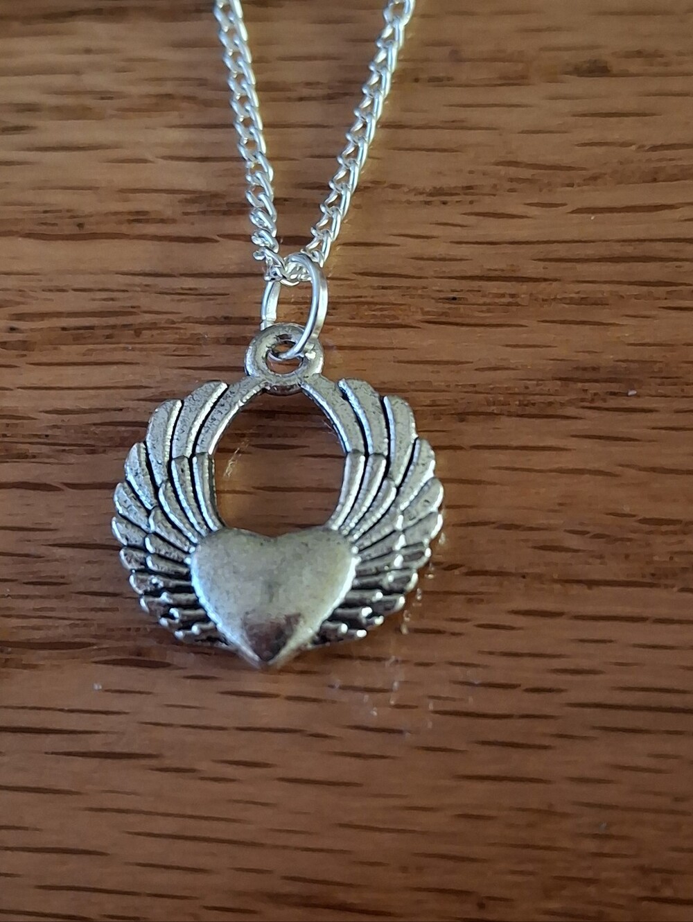 Silver Winged Heart Pendant With 18" Necklace